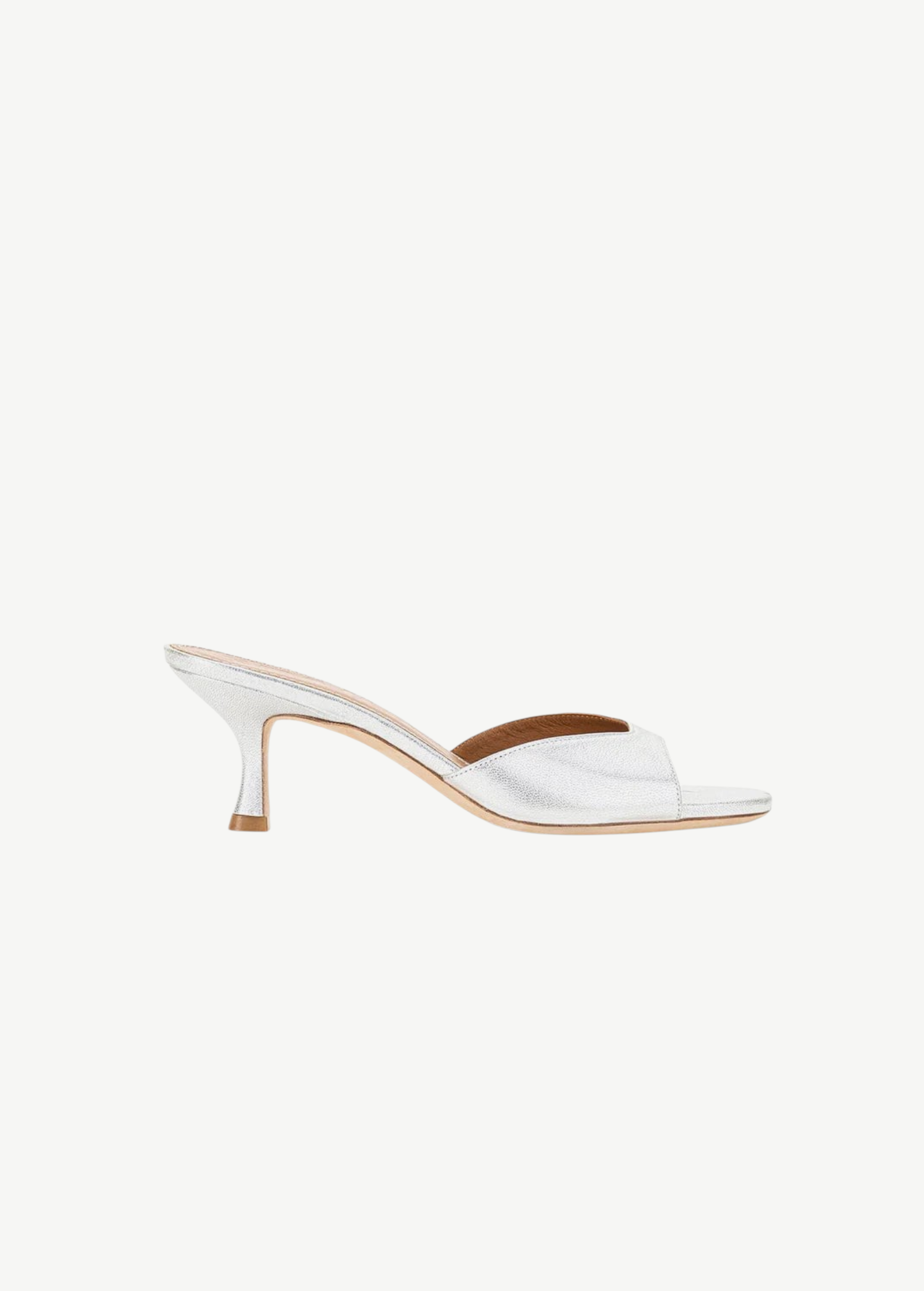 Metallic silver Brigitte Heel mule with a refined silhouette and kitten heel.