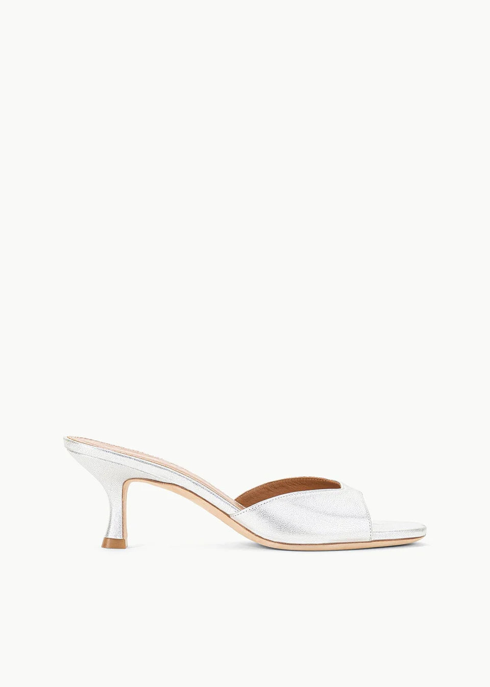 Metallic silver Brigitte Heel mule with a refined silhouette and kitten heel.