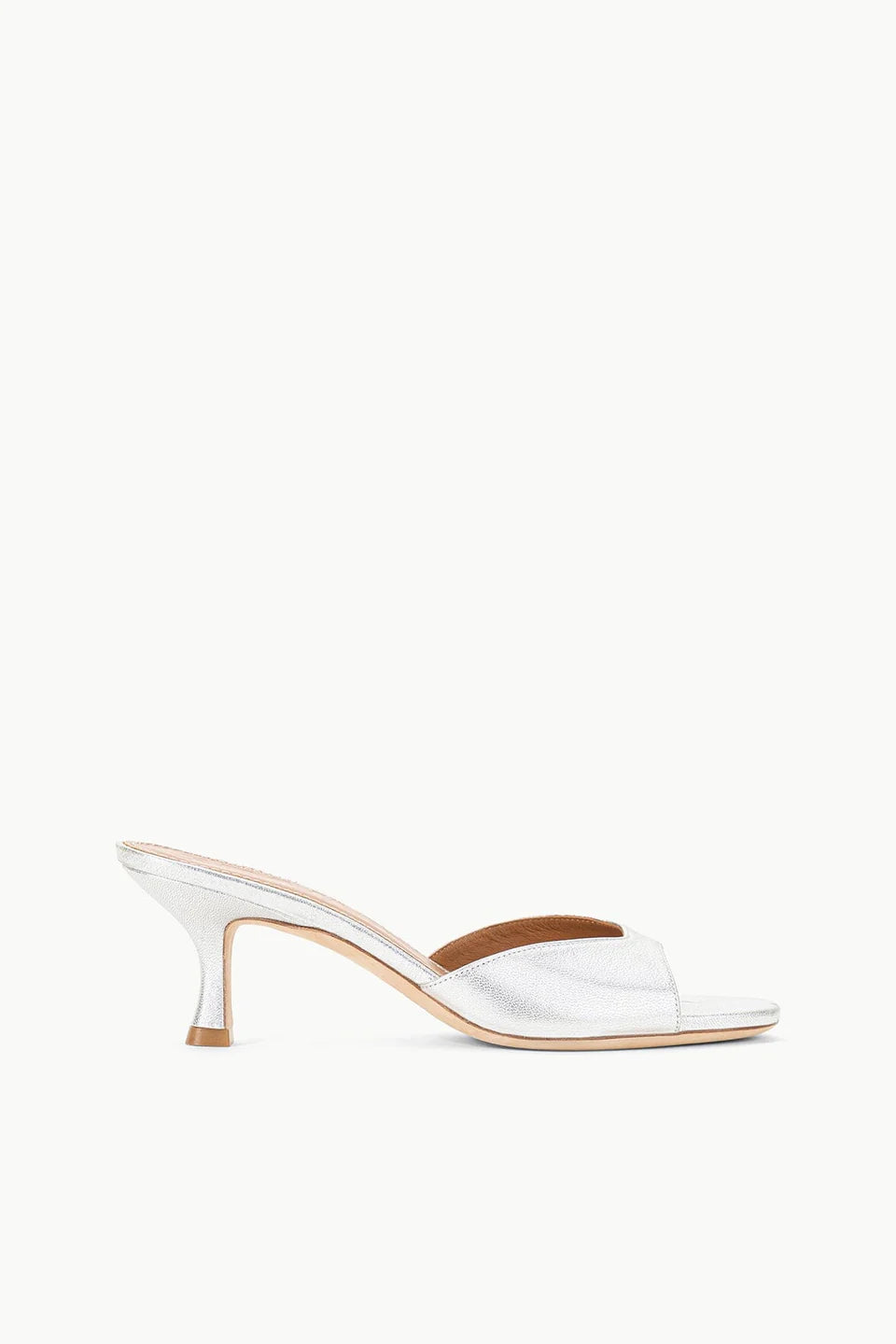 Metallic silver Brigitte Heel mule with a refined silhouette and kitten heel.