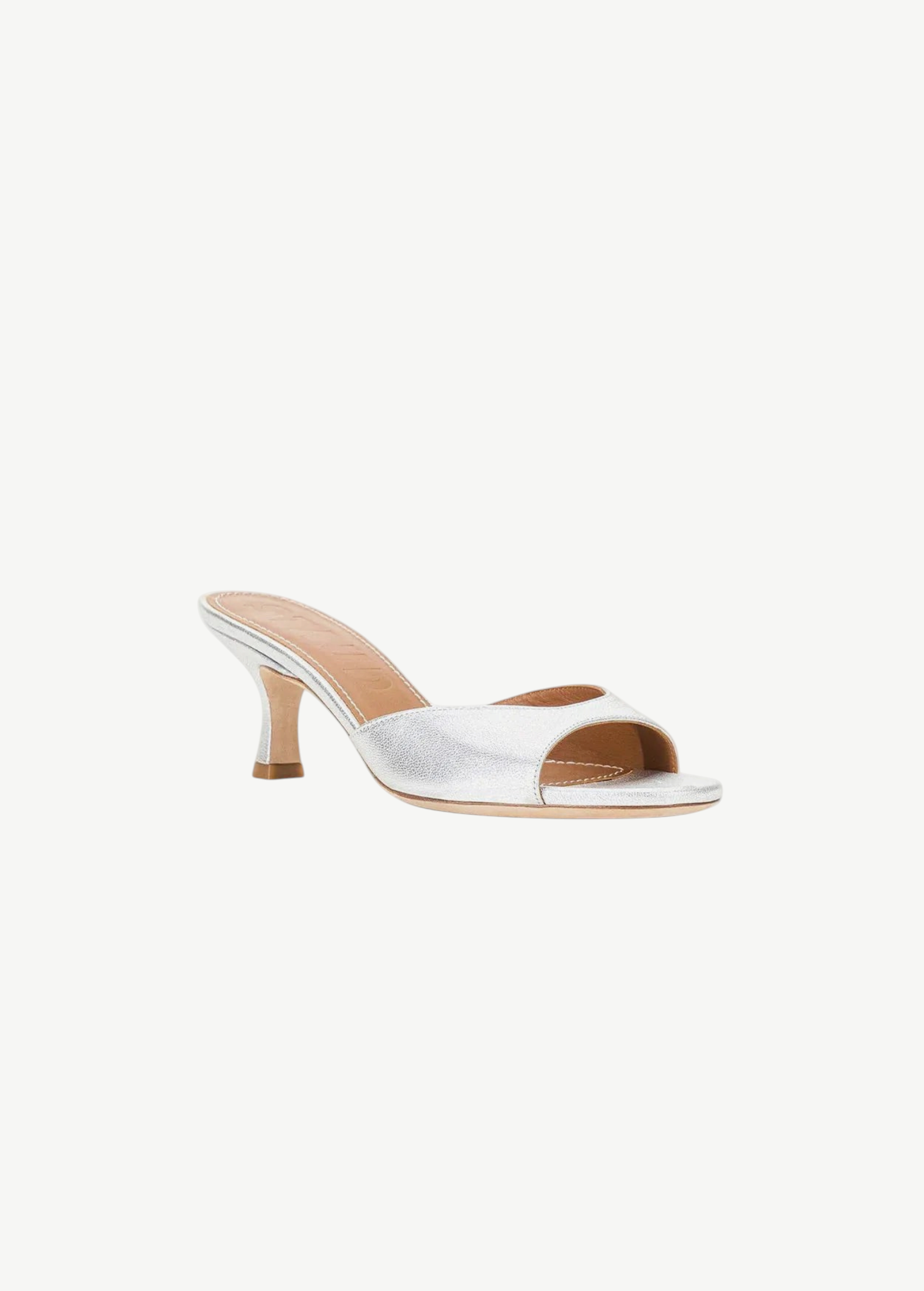 Silver metallic Brigitte Heel mule with an open-toe, low kitten heel, and a refined silhouette.