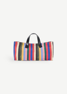 KABE SHOP INC Port tote bag in multi-colored striped canvas with structured silhouette and black leather handles.