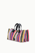 KABE SHOP INC Port tote bag in multi-colored striped canvas with black leather handles and a structured silhouette.