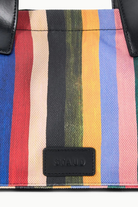 KABE SHOP INC Port tote bag in multi-colored vertical striped canvas with black leather trim and embossed logo patch