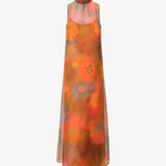 Albee Dress in a sleeveless, floor-length sheer silhouette with a high neckline and an abstract orange, yellow, and blue floral print.