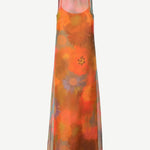 Albee Dress in a sleeveless, floor-length sheer silhouette with a high neckline and an abstract orange, yellow, and blue floral print.