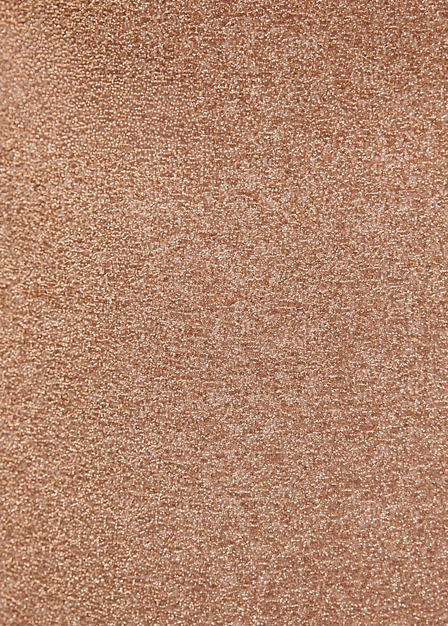 Close-up of a glittery, textured rose gold surface with a shimmering effect reminiscent of the Gwen Skirt. The image showcases fine, reflective particles that create a sparkling appearance.