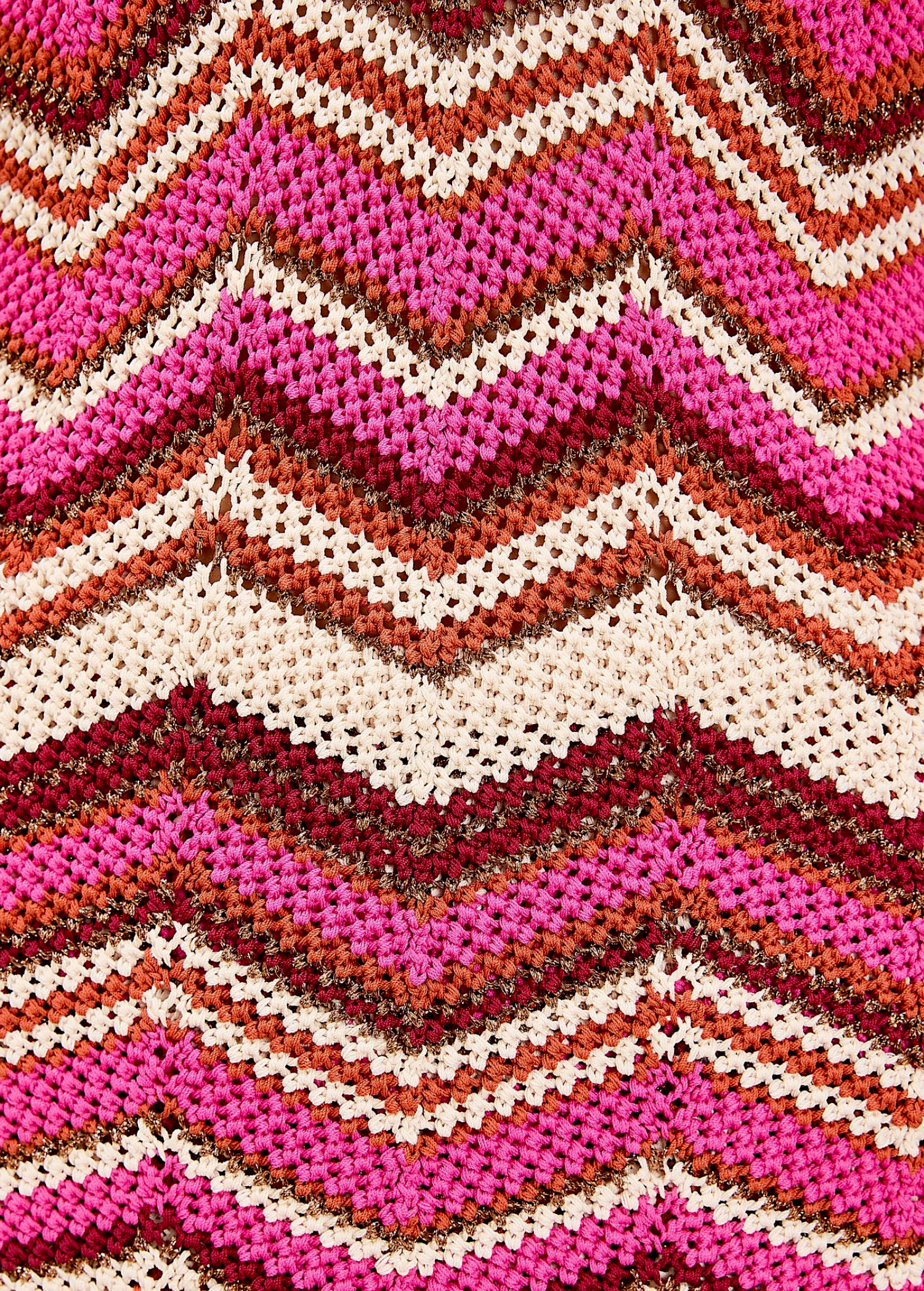 KABE SHOP INC Cierra Pant featuring a vibrant pink, cream, and metallic bronze chevron knit pattern