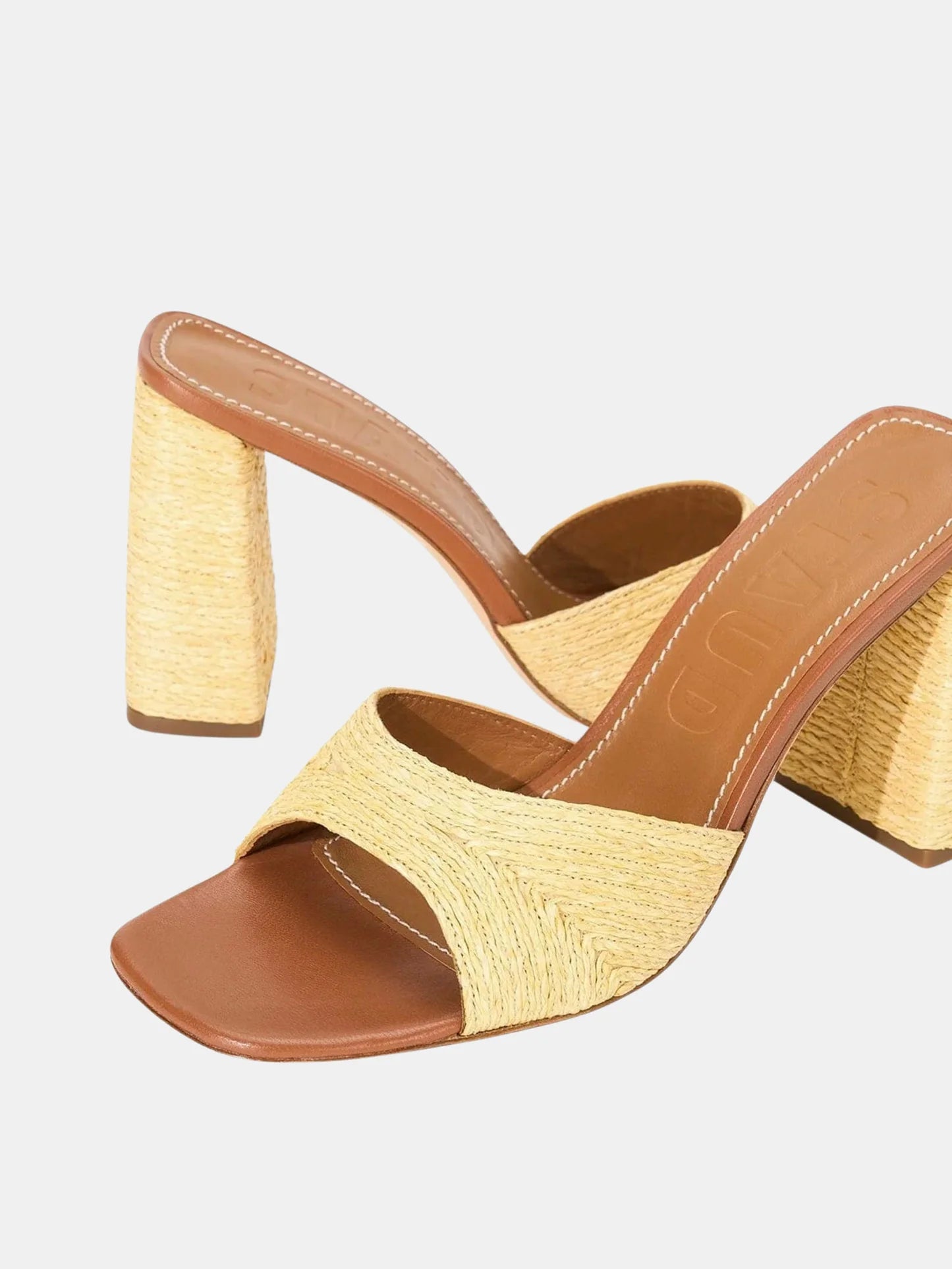 Sloane Heel tan woven raffia slide sandals with brown leather insoles and thick, matching block heels in a timeless silhouette.