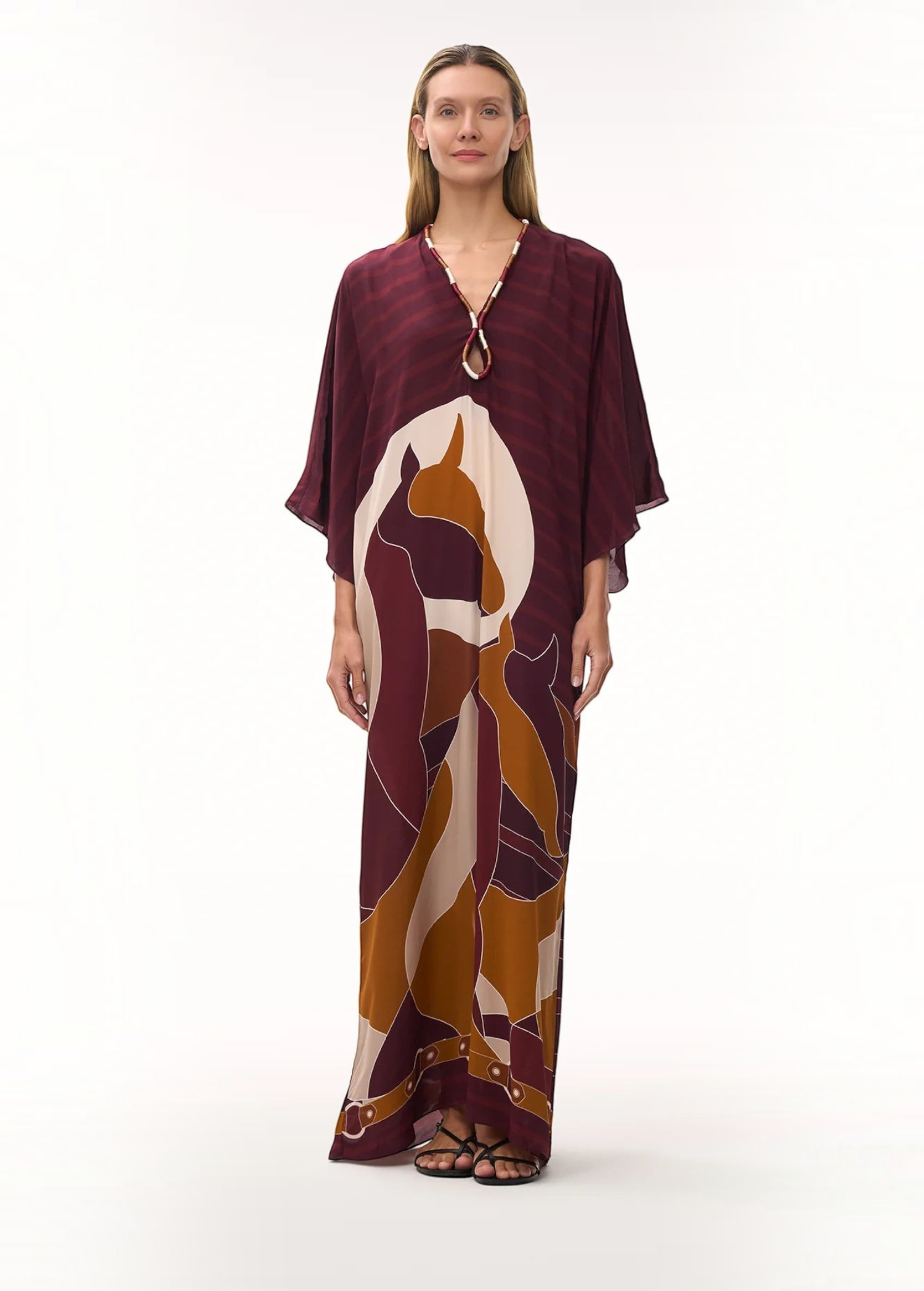KABE SHOP INC purple crepe de chine tunic featuring horse motif embroidery and a signature St. Tropez neckline.