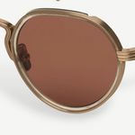 KABE SHOP INC Annie-O round sunglasses in rose gold with acetate-wrapped titanium frames and step-cut temples.