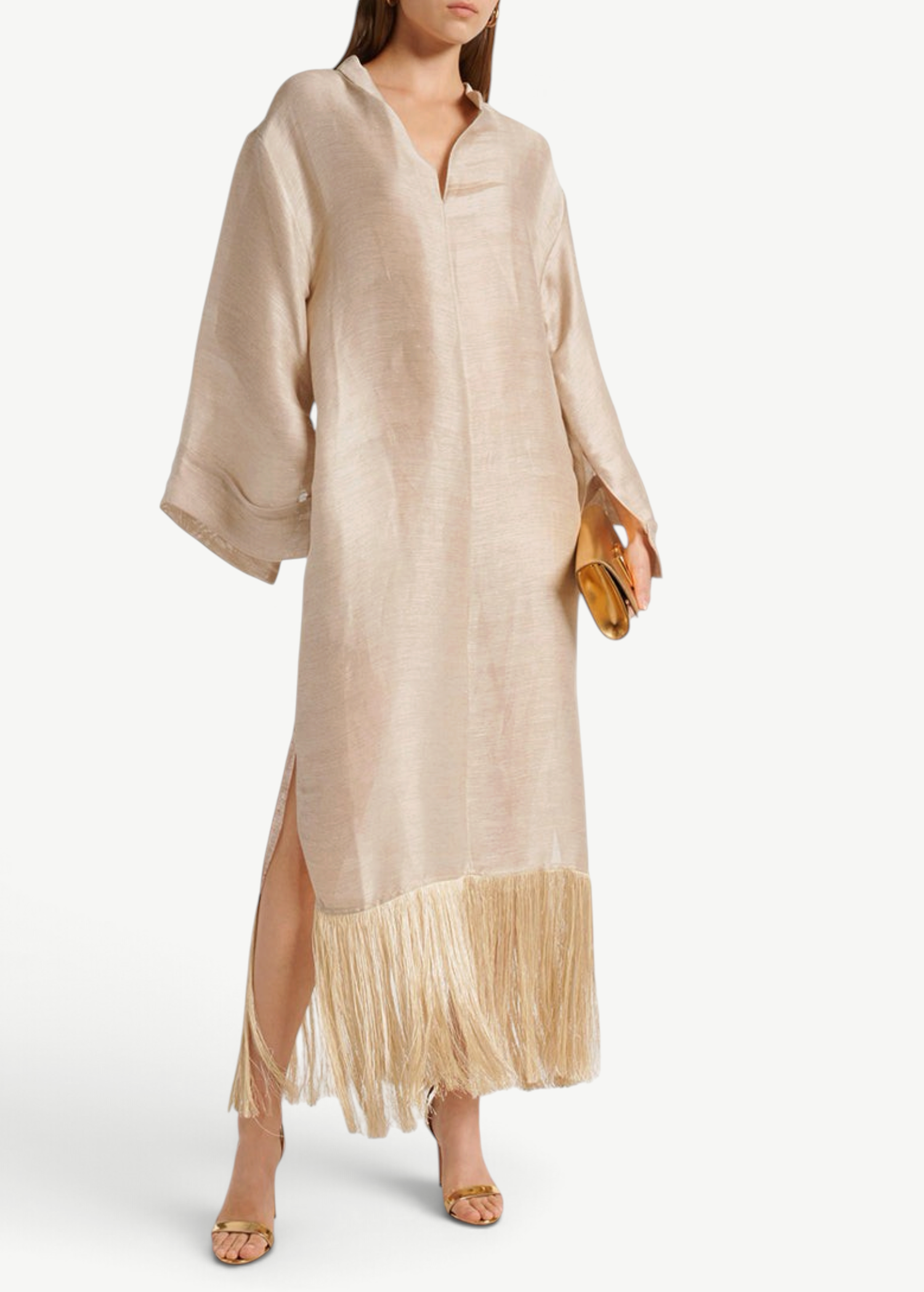 KABE SHOP INC Tigris ecru linen-blend gown with wide sleeves and dramatic fringe hem worn by a model