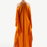 KABE SHOP INC Volturno kaftan in vibrant orange with off-shoulder halterneck, flowing sleeves, and ring details.