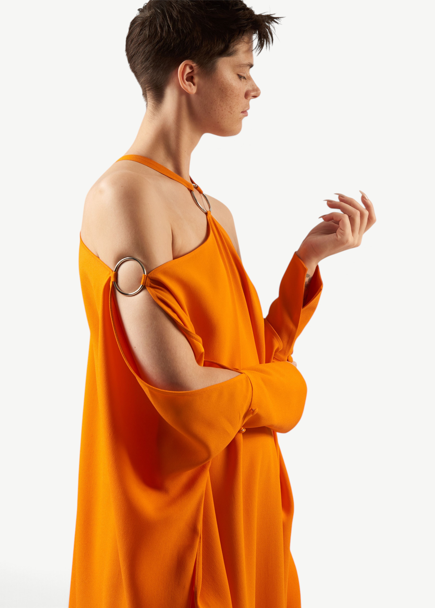 KABE SHOP INC Volturno kaftan in vibrant orange with off-shoulder halterneck and silver ring embellishments