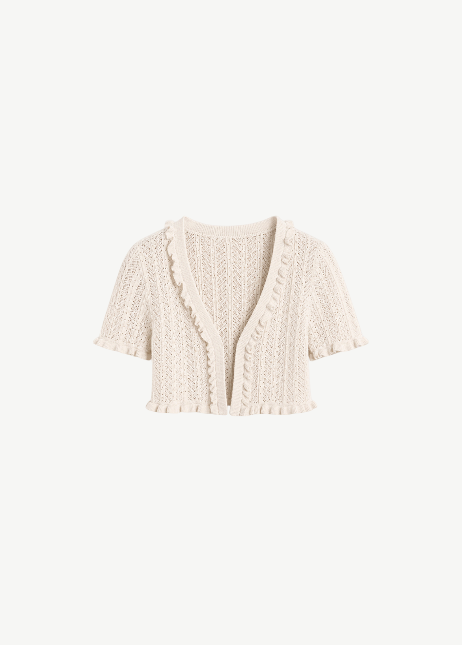 Charlene Top in cream-colored knit, featuring a cropped V-neckline with ruffled trim along the open-front edges, sleeves, and hem.
