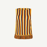 Misti Sleeveless Top featuring a sleek silhouette with vertical yellow, brown, white, and black stripes and an artisanal fringed hem.