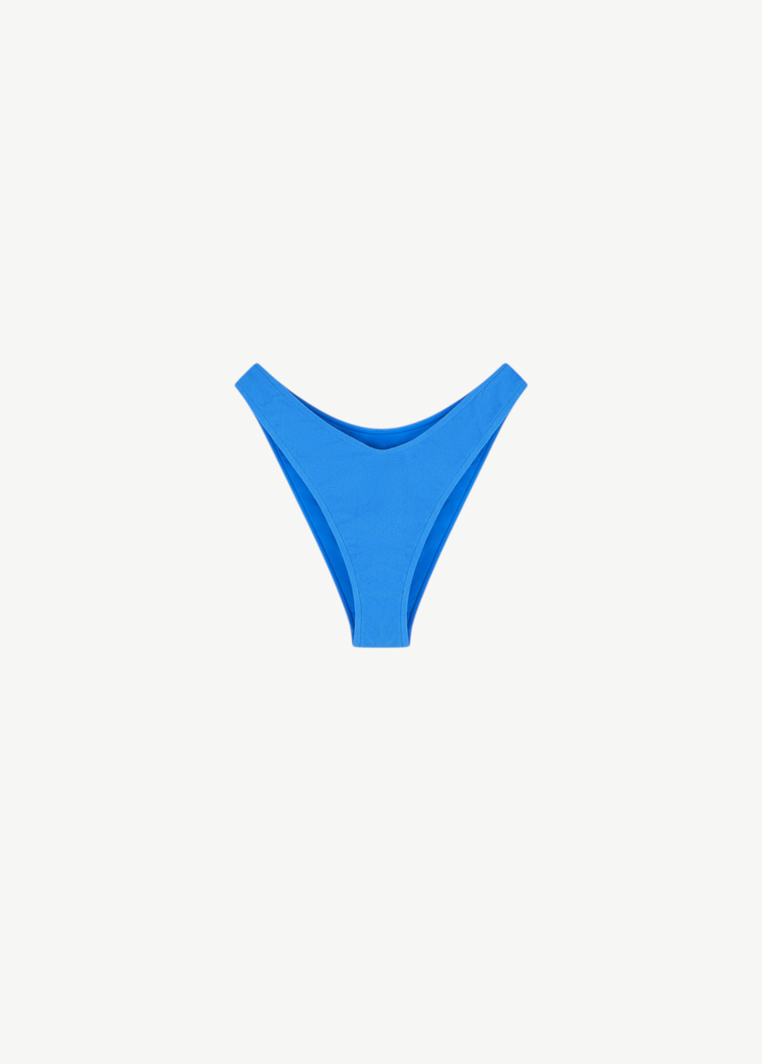KABE SHOP INC ocean blue textured high-cut bikini brief with a curved waistline and wide sides.