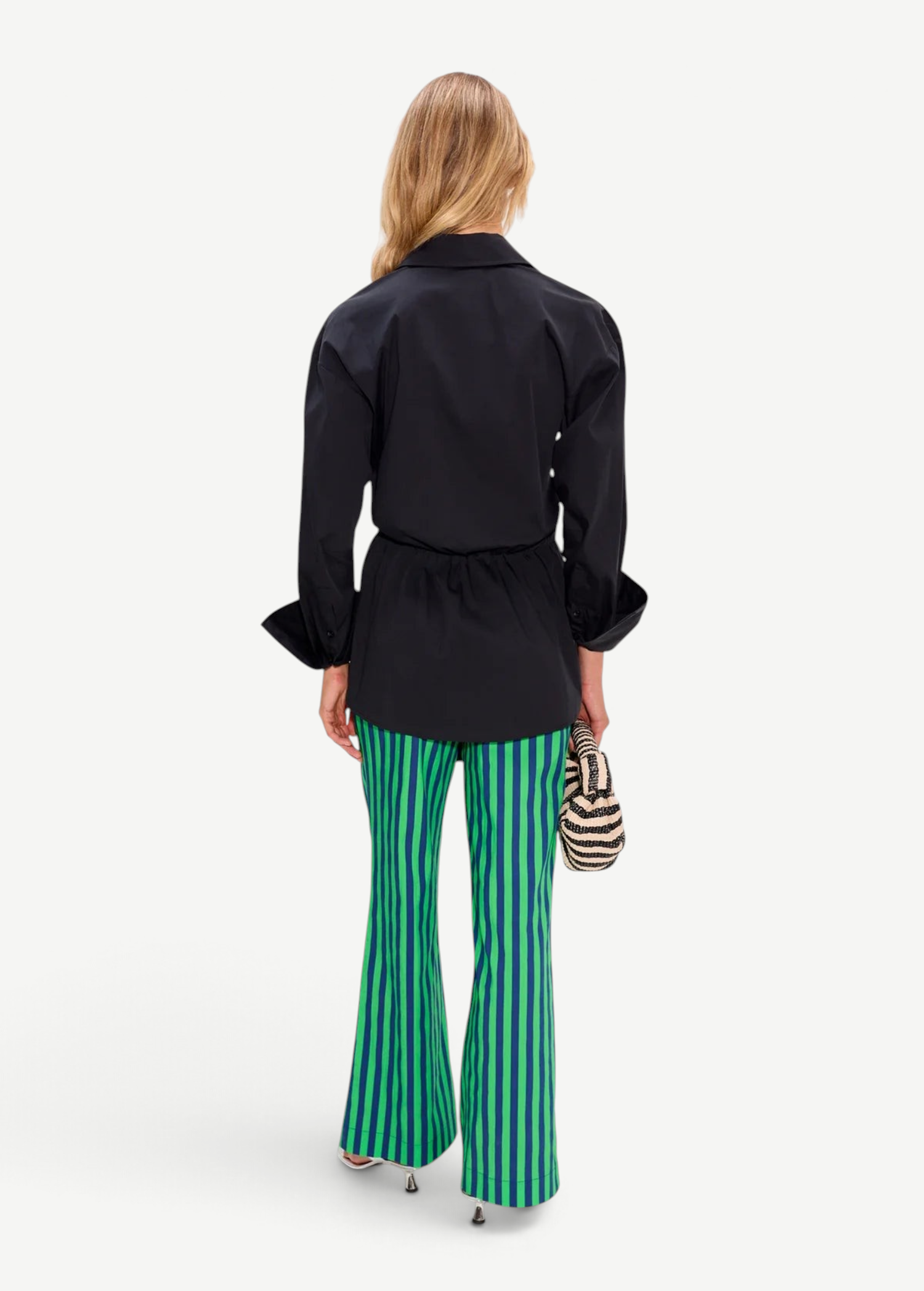 KABE SHOP INC Pia Poplin Pant in vibrant fruit punch green and blue stripes, worn with a black tailored shirt.