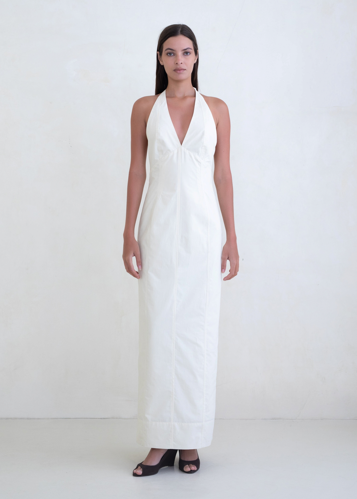 KABE SHOP INC Helia white floor-length halter gown with a plunging neckline and sleek sculpted silhouette