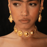 KABE SHOP INC Wasi choker featuring sculptural golden spheres inspired by Tayrona culture worn by a model
