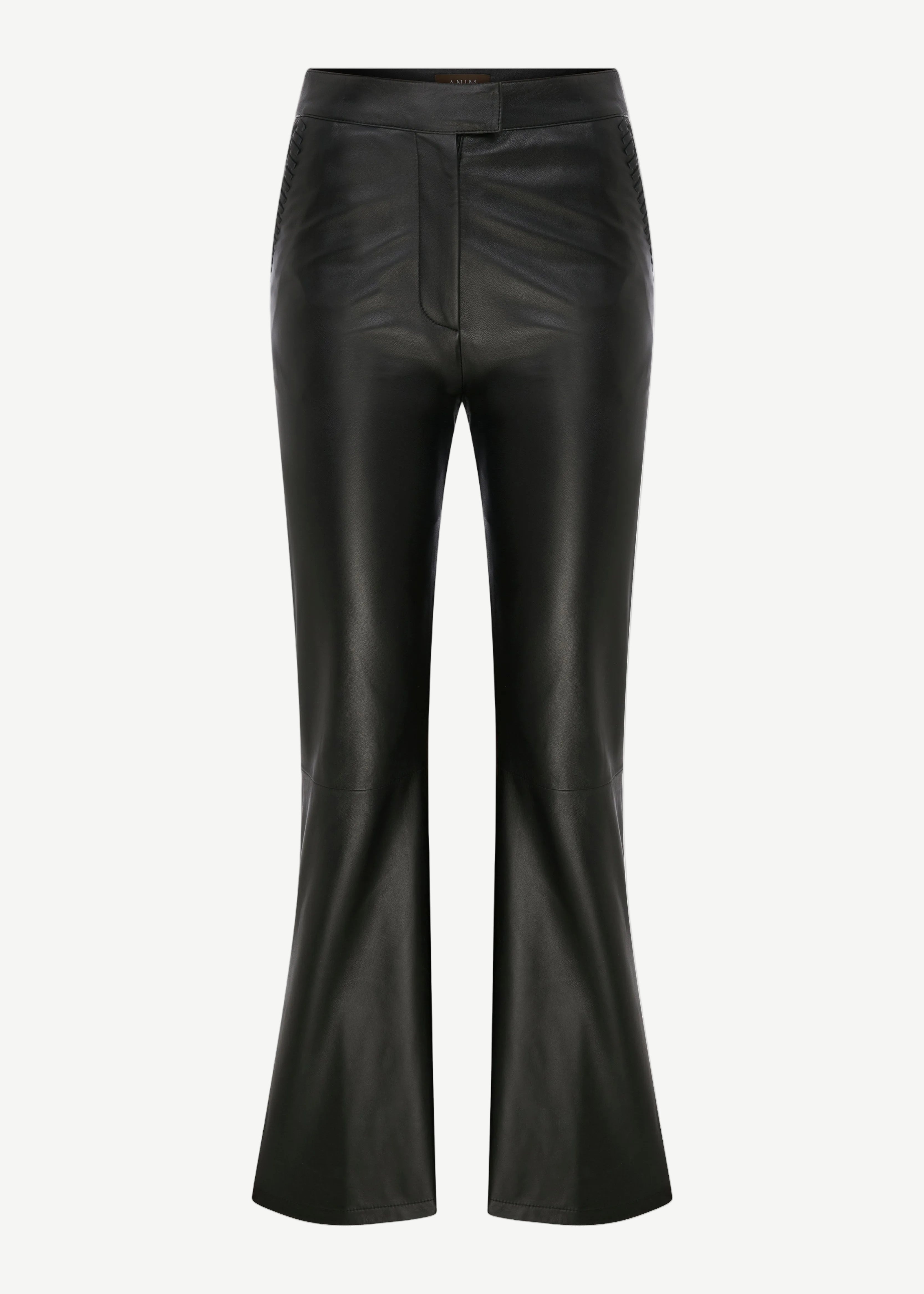 The Xena Pants are black leather flared pants with a front fly, fitted through the hips and thighs, and a slight flare at the hem. Displayed against a white background, they are shown in full length from waist to hem.