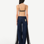 KABE SHOP INC Zaya top featuring an open-back design with adjustable straps and elegant flowing tulle tie details.