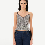 KABE SHOP INC Zaya top featuring silver sequin embellishments, adjustable straps, and sheer black tulle tie detail.