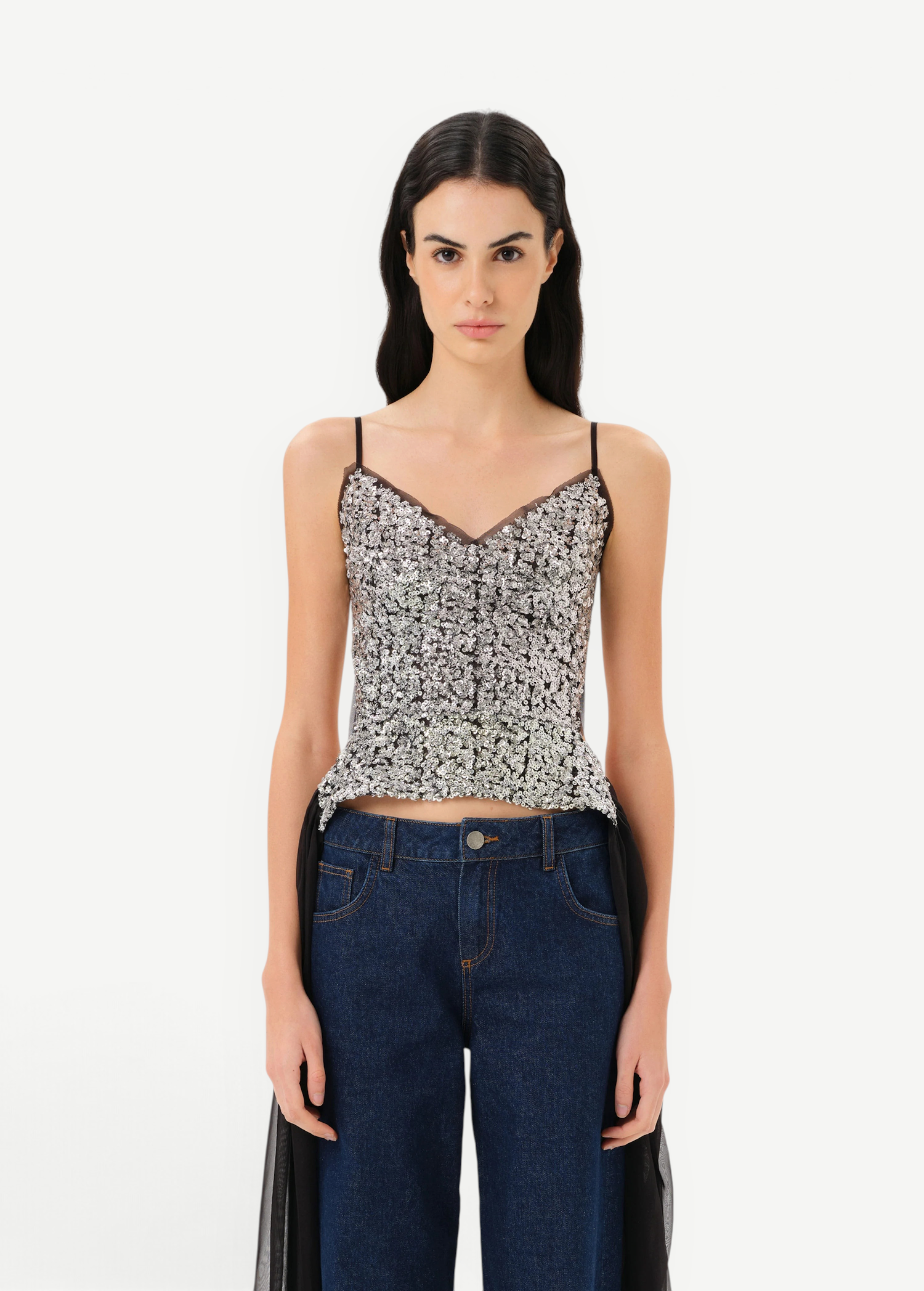 KABE SHOP INC Zaya top featuring silver sequin embellishments, adjustable straps, and sheer black tulle tie detail.