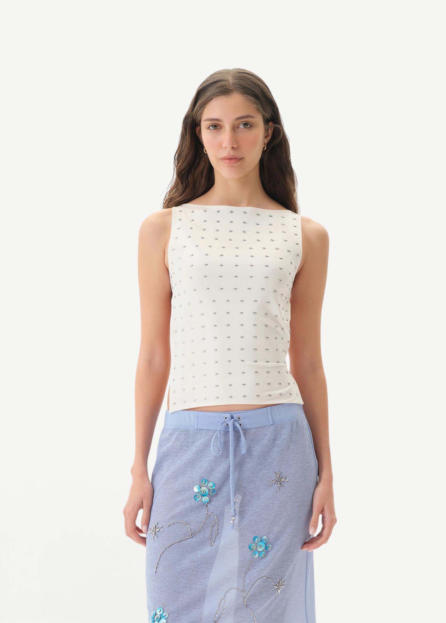 KABE SHOP INC Zelna top in white featuring sculptural stud detailing and a sleek, form-fitting sleeveless silhouette.