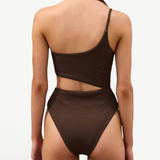 KABE SHOP INC Cocoa Textured one-piece swimsuit with one-shoulder design and waist cut-out, back view.