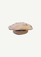 KABE SHOP INC handcrafted beige crochet hat with colorful embroidered accents and a blue brim detail