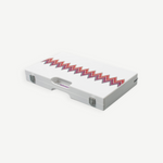 The ZigZag Backgammon Board Game features a closed white acrylic case adorned with colorful zigzag patterns and metal clasps, as well as a small handle slot centered at the front—making this striking set a standout on any coffee table.