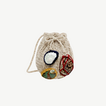 KABE SHOP INC Jali Bag in beige knit with decorative shell accents and a drawstring closure