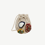 KABE SHOP INC Jali Bag in beige knit with decorative shell accents and a drawstring closure