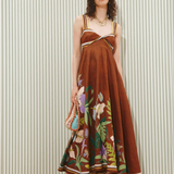KABE SHOP INC Alfie Twist midi sundress in brown with floral print, featuring a fitted bodice and flared skirt.
