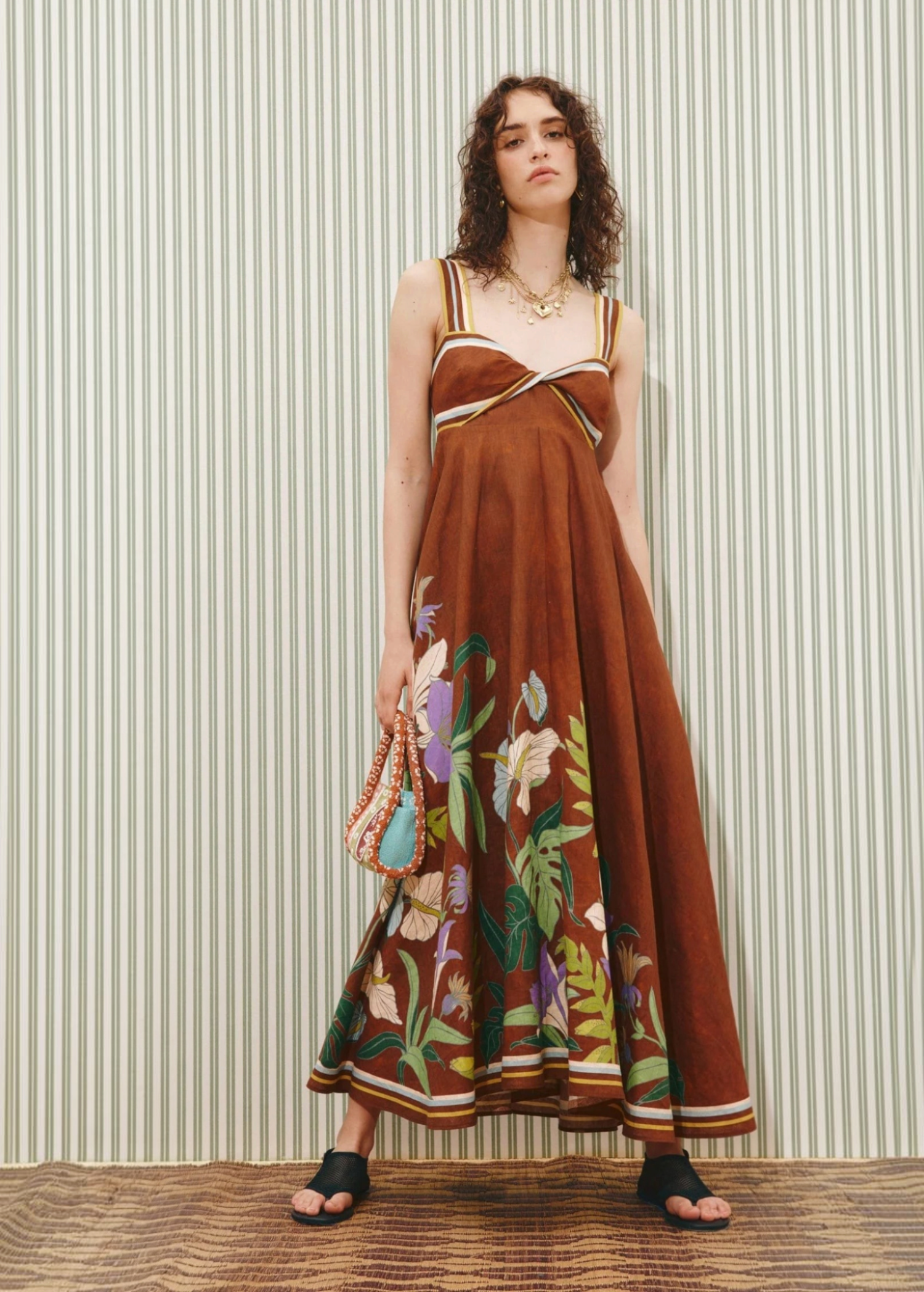KABE SHOP INC Alfie Twist midi sundress in brown with floral print, featuring a fitted bodice and flared skirt.