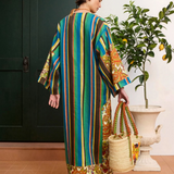 KABE SHOP INC Charlie midi dress in multi-coloured striped linen with floral sleeves and side splits, back view