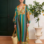 KABE SHOP INC Charlie midi dress in lightweight linen with a vibrant floral and striped pattern and deep V-neck.