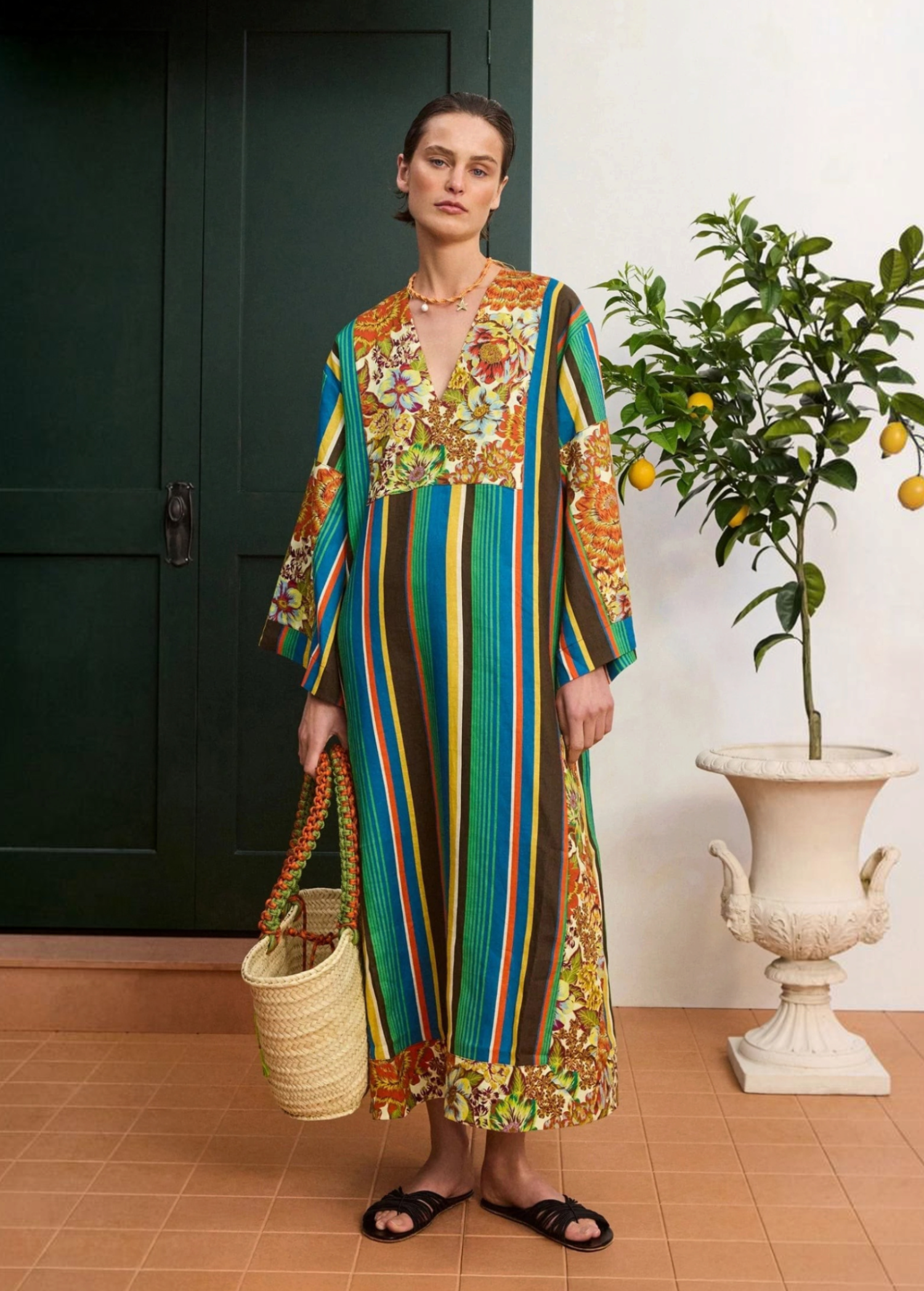KABE SHOP INC Charlie midi dress in lightweight linen with a vibrant floral and striped pattern and deep V-neck.
