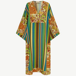 KABE SHOP INC Charlie midi dress in lightweight linen with a vibrant floral and striped pattern and deep V-neck.