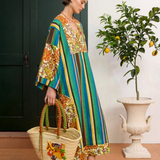 KABE SHOP INC Charlie midi dress in lightweight linen with a vibrant multi-colored floral and stripe print