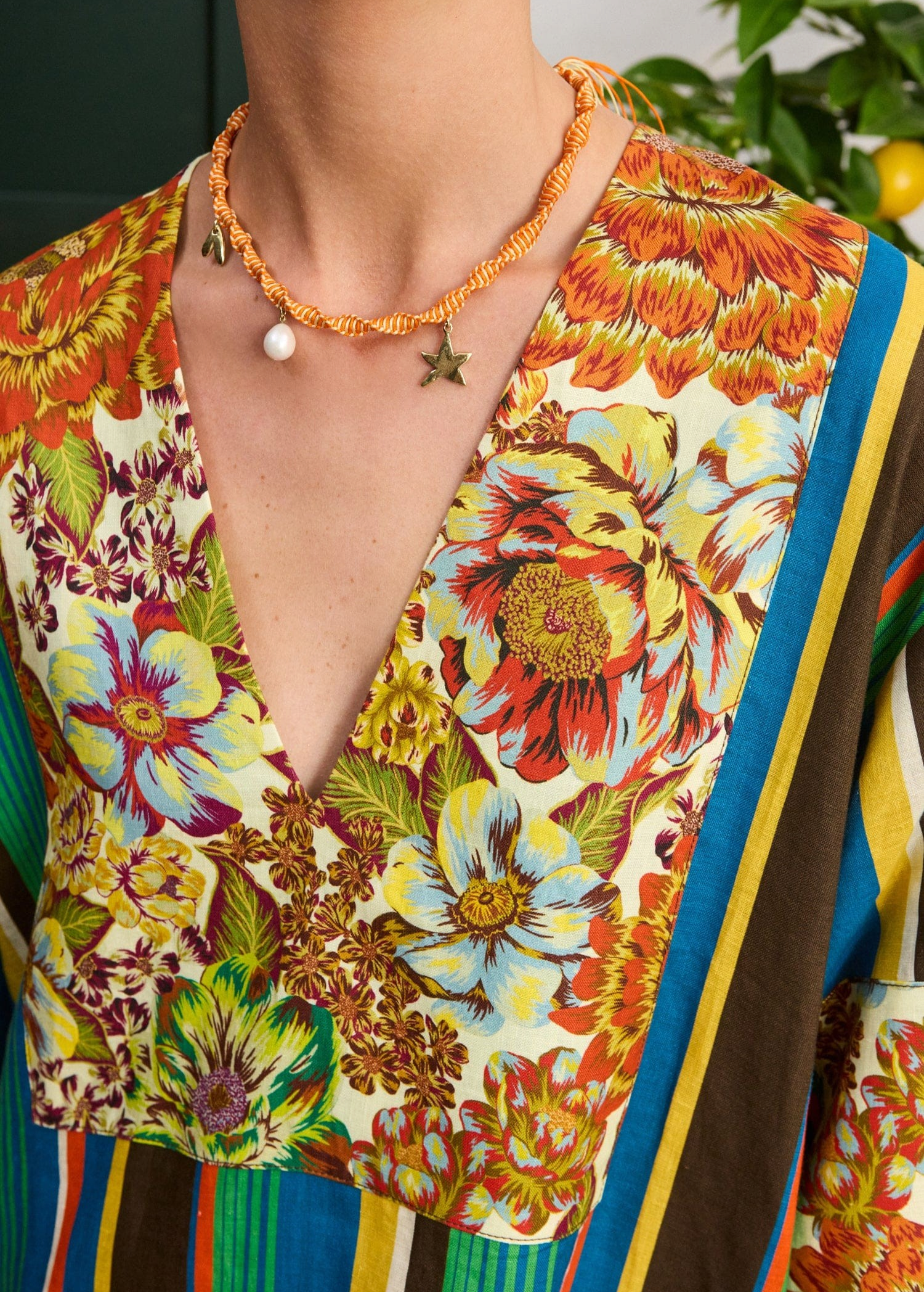 KABE SHOP INC Charlie midi dress in floral linen with a deep V-neck and vibrant multi-coloured botanical print