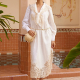 KABE SHOP INC Rosemary midi dress in white linen with intricate lace hem and oversized collar worn by a model