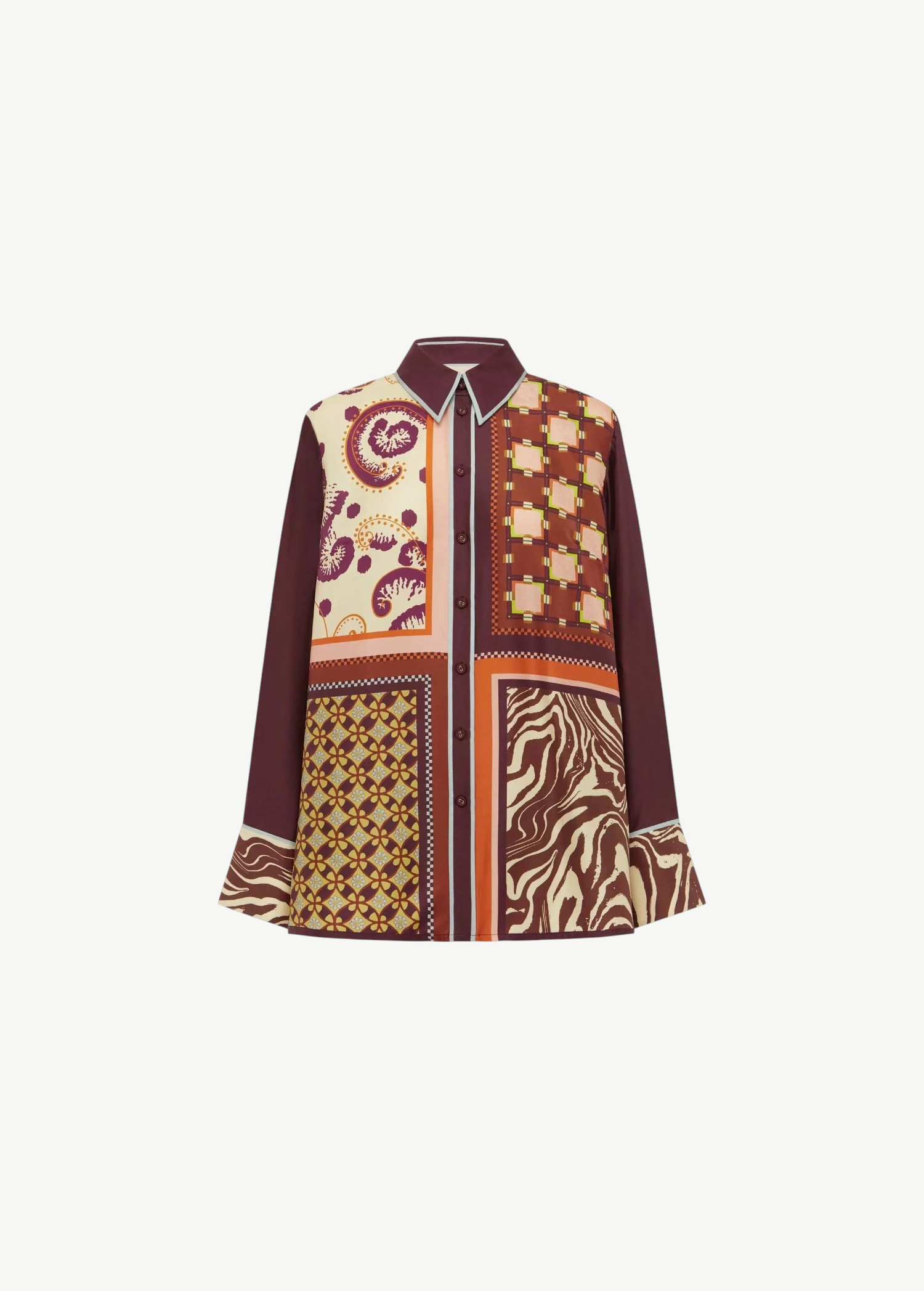 The Wilson Shirt is a versatile, relaxed-fit button-down featuring a patchwork of paisley, geometric, and zebra-print panels in shades of maroon, orange, and cream.