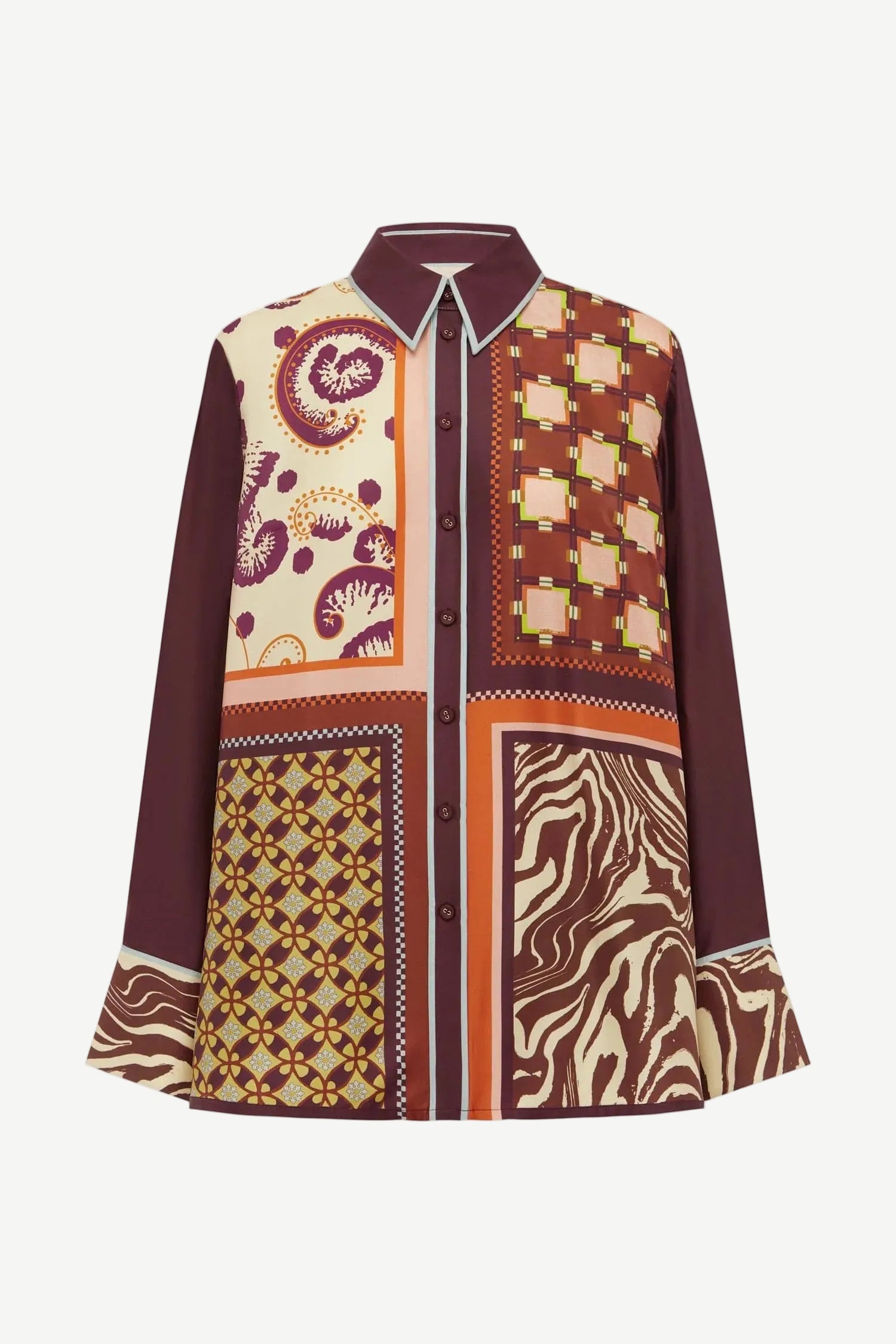 The Wilson Shirt is a versatile, relaxed-fit button-down featuring a patchwork of paisley, geometric, and zebra-print panels in shades of maroon, orange, and cream.