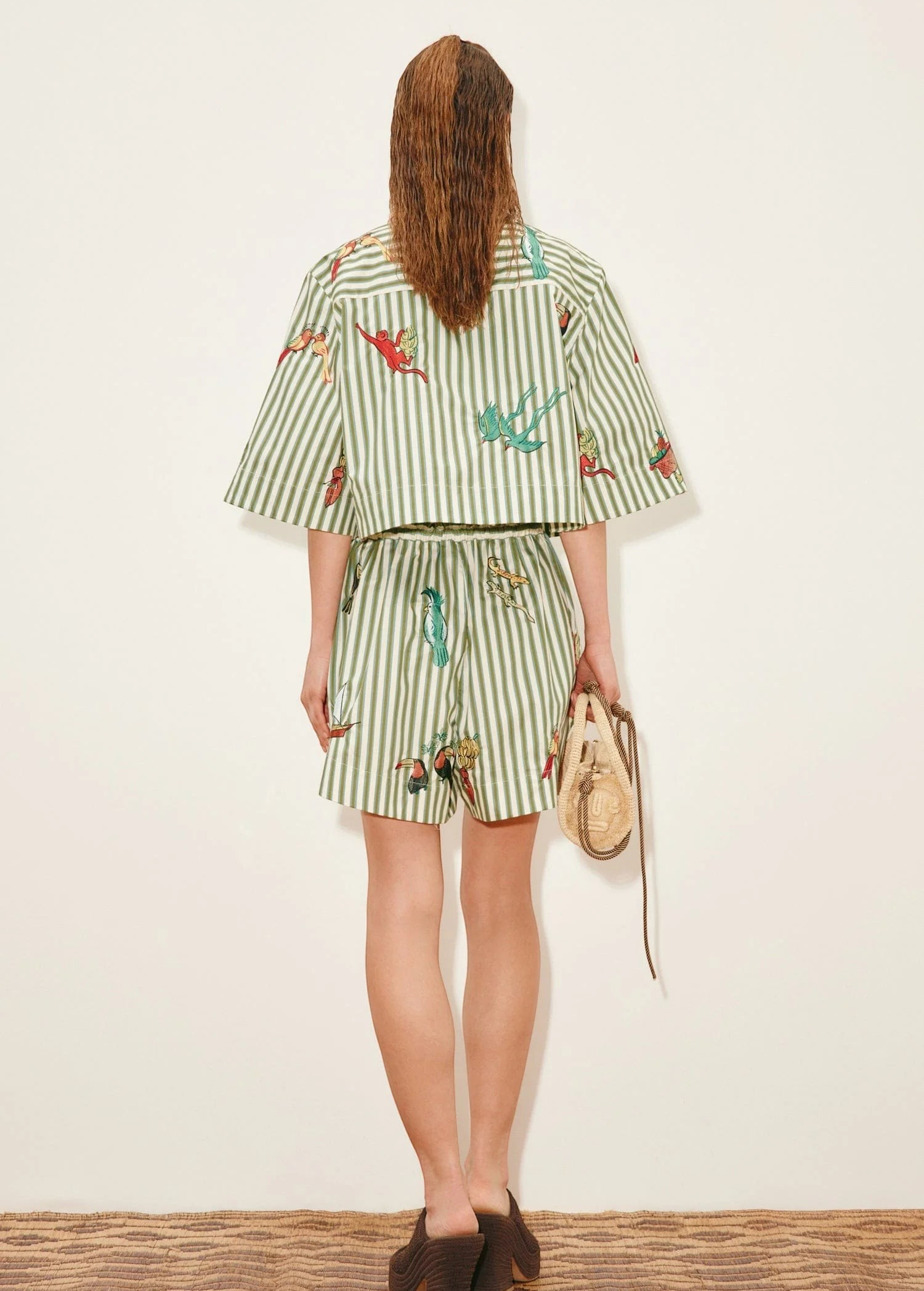 KABE SHOP INC Bisou relaxed jogger shorts in green and white stripe with tropical animal print, back view
