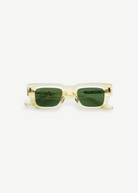 KABE SHOP INC Ares sunglasses featuring a thick translucent champagne frame and dark green lenses with Art Deco detail