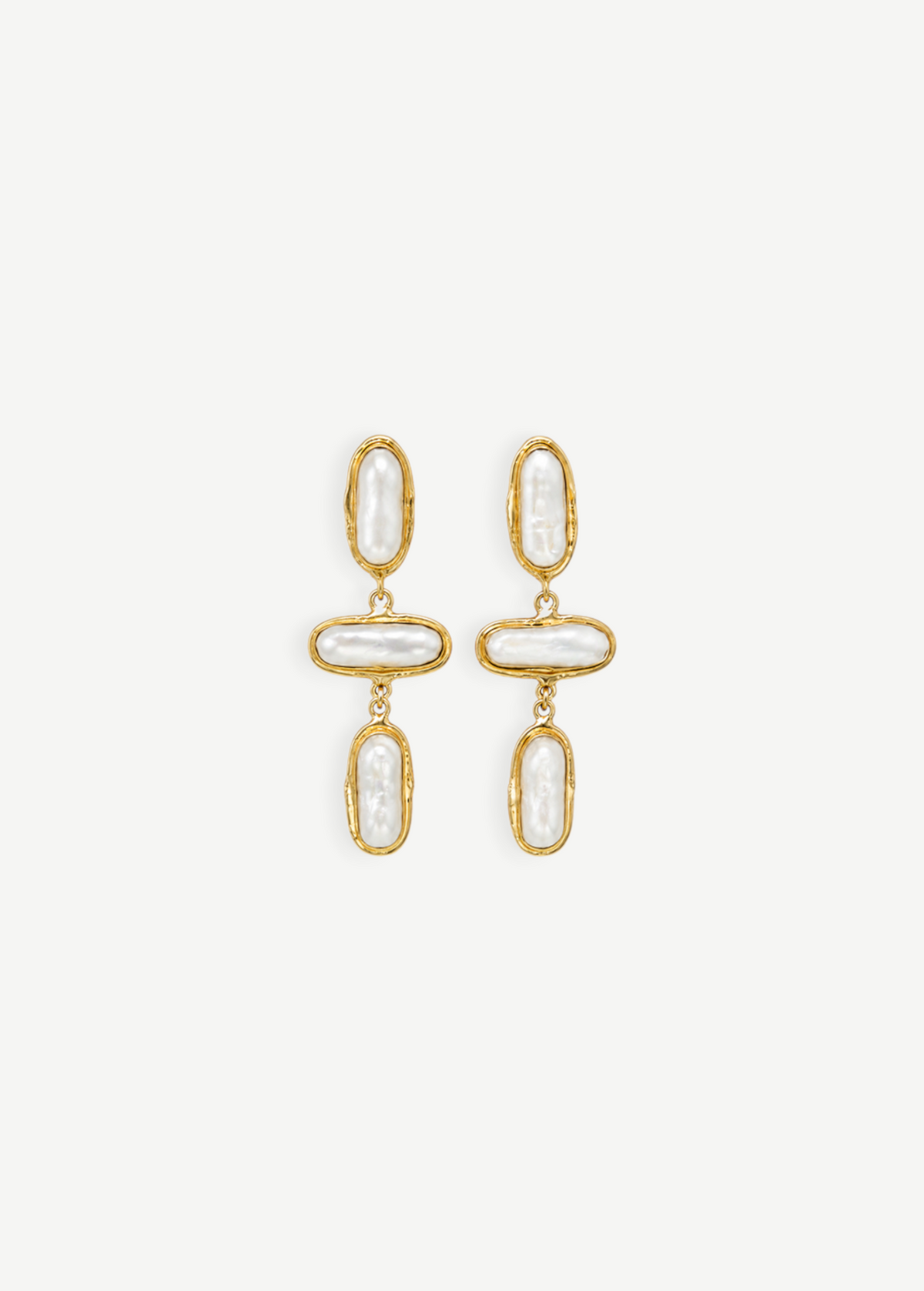 KABE SHOP INC Grace earrings featuring organic baroque pearls set in textured gold frames in a drop design.