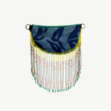 KABE SHOP INC Verdi bag featuring blue patterned fabric with long, colourful beaded fringe and yellow accents.