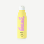 KABE SHOP INC SPF 50 invisible mist sunscreen spray in a yellow bottle with pink branding for easy sun protection.