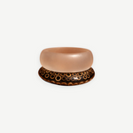 KABE SHOP INC wood and resin bangle set featuring a translucent resin band and a dark wood band with circle patterns.